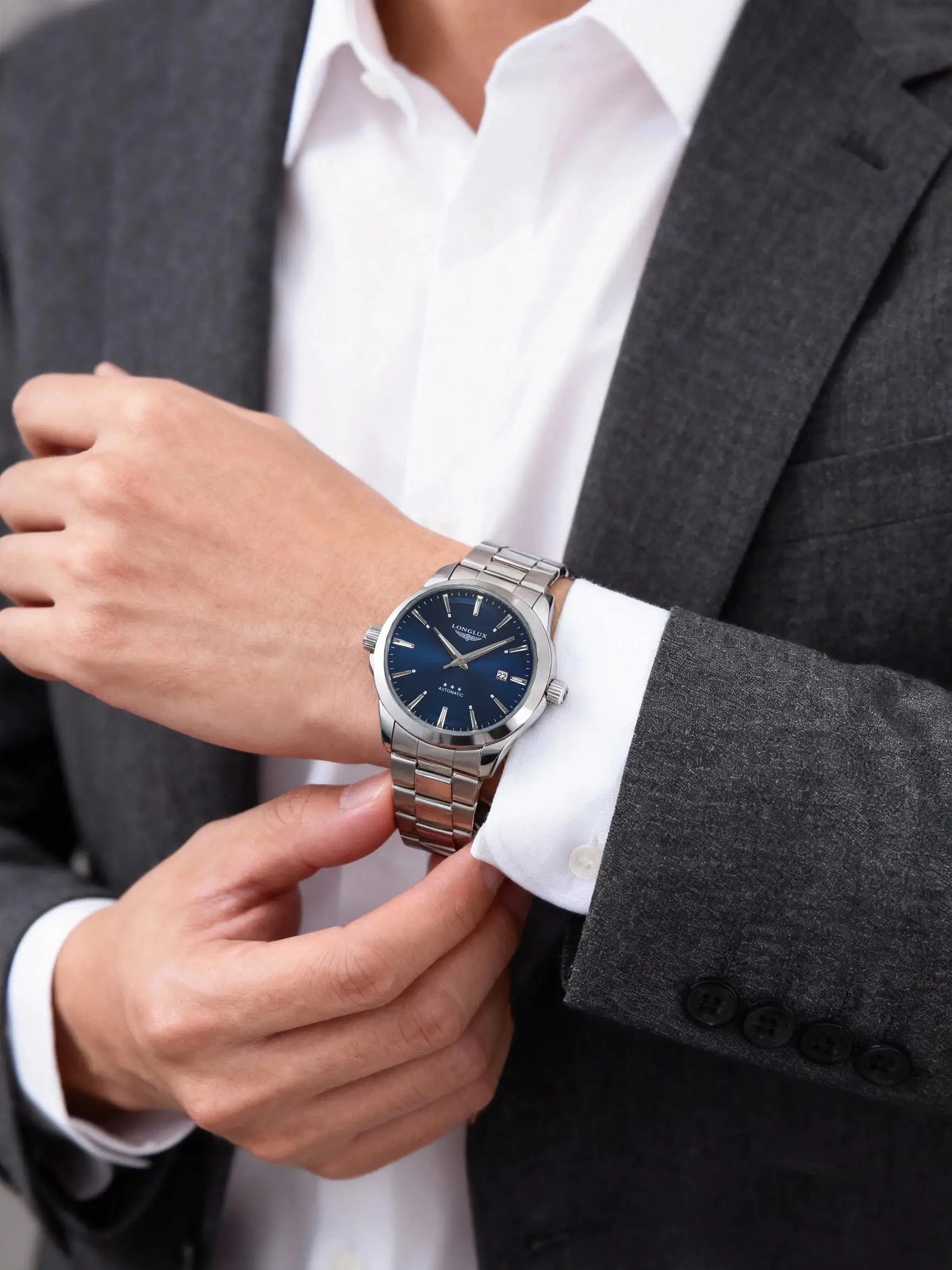 Men's stainless steel automatic wristwatch with blue dial and date window