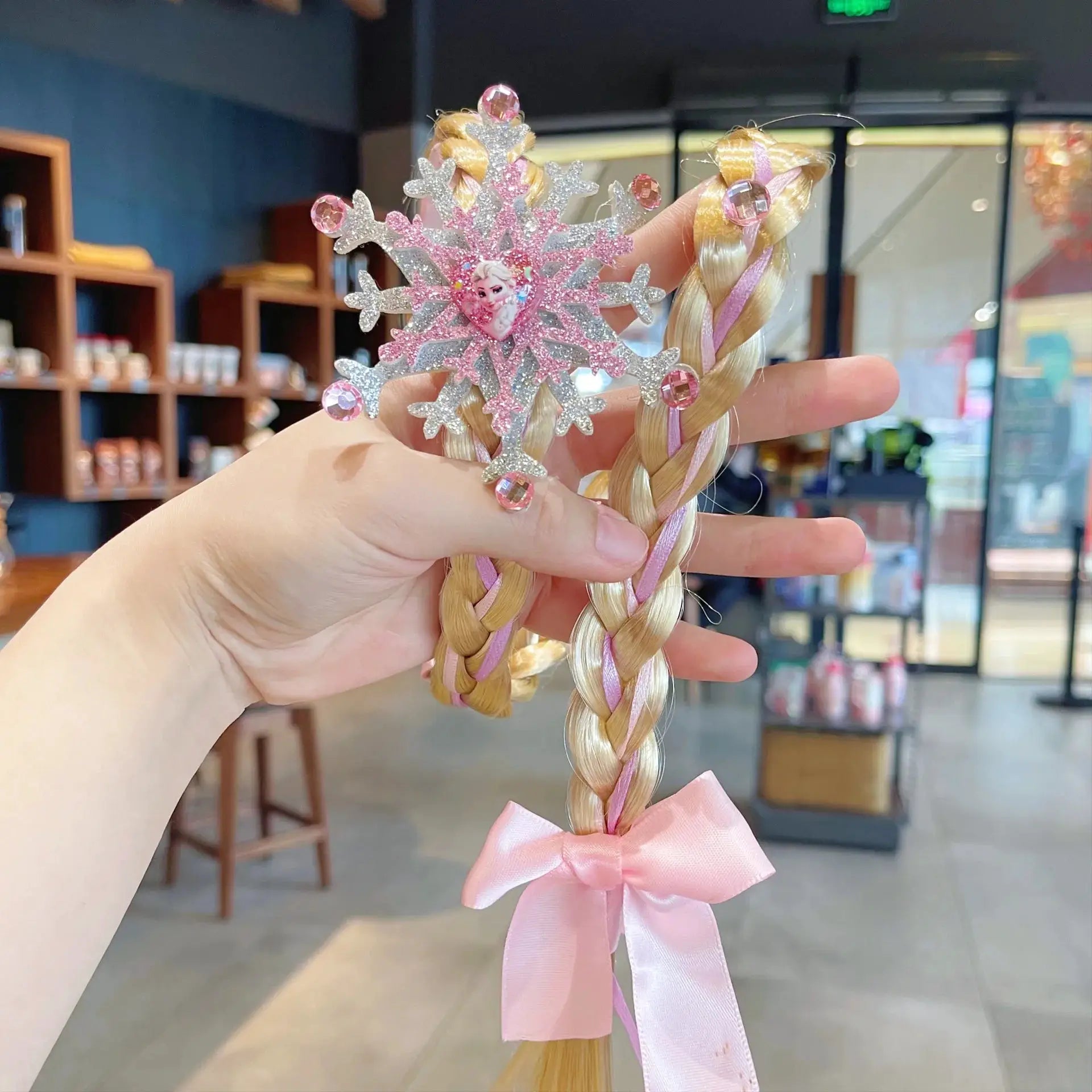 Elsa princess crown headband with glitter silver-pink snowflake and pink gems; braided blonde wig with pink ribbon bow