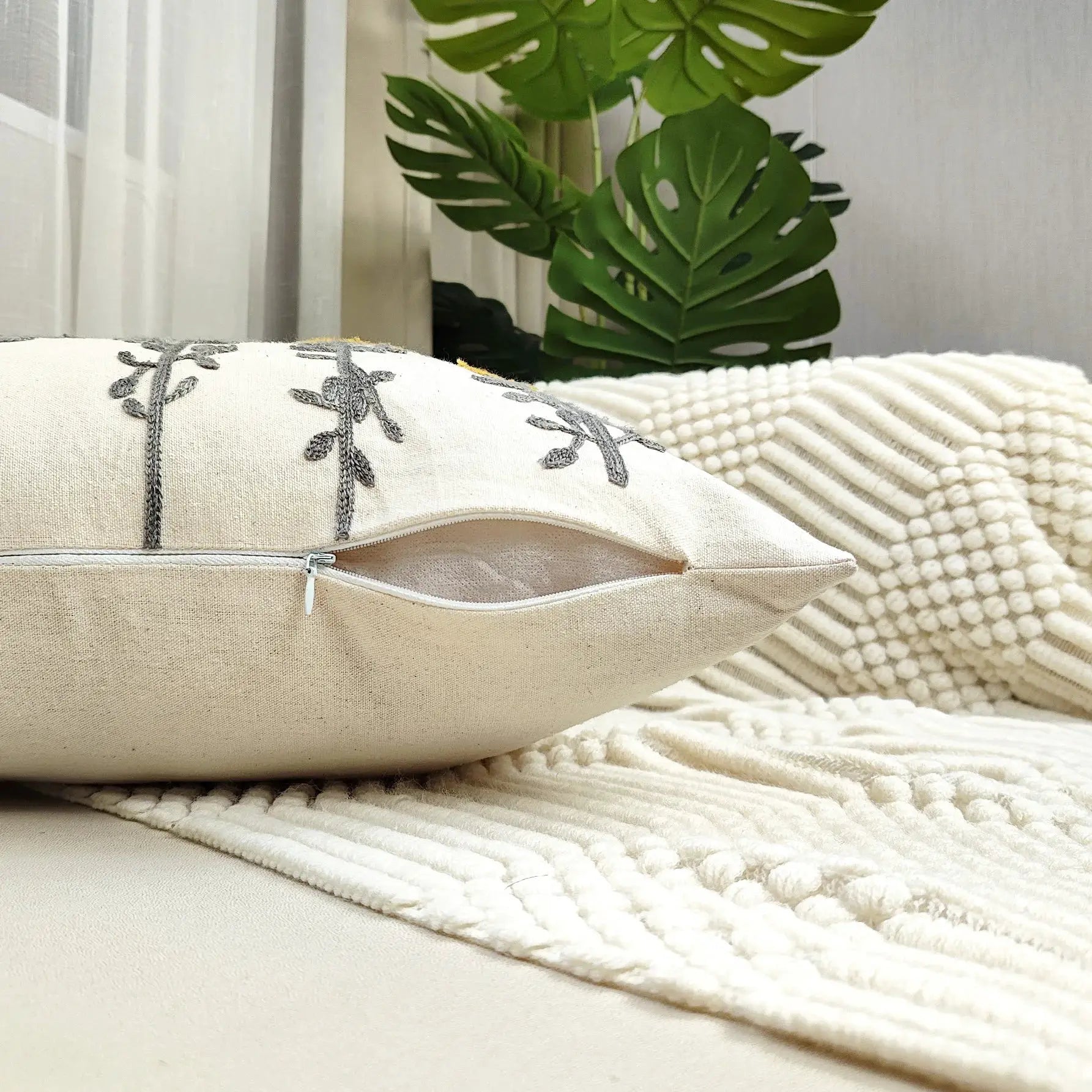 Beige cushion cover with gray boho tufted embroidery and zipper closure; 1pc Simples Market