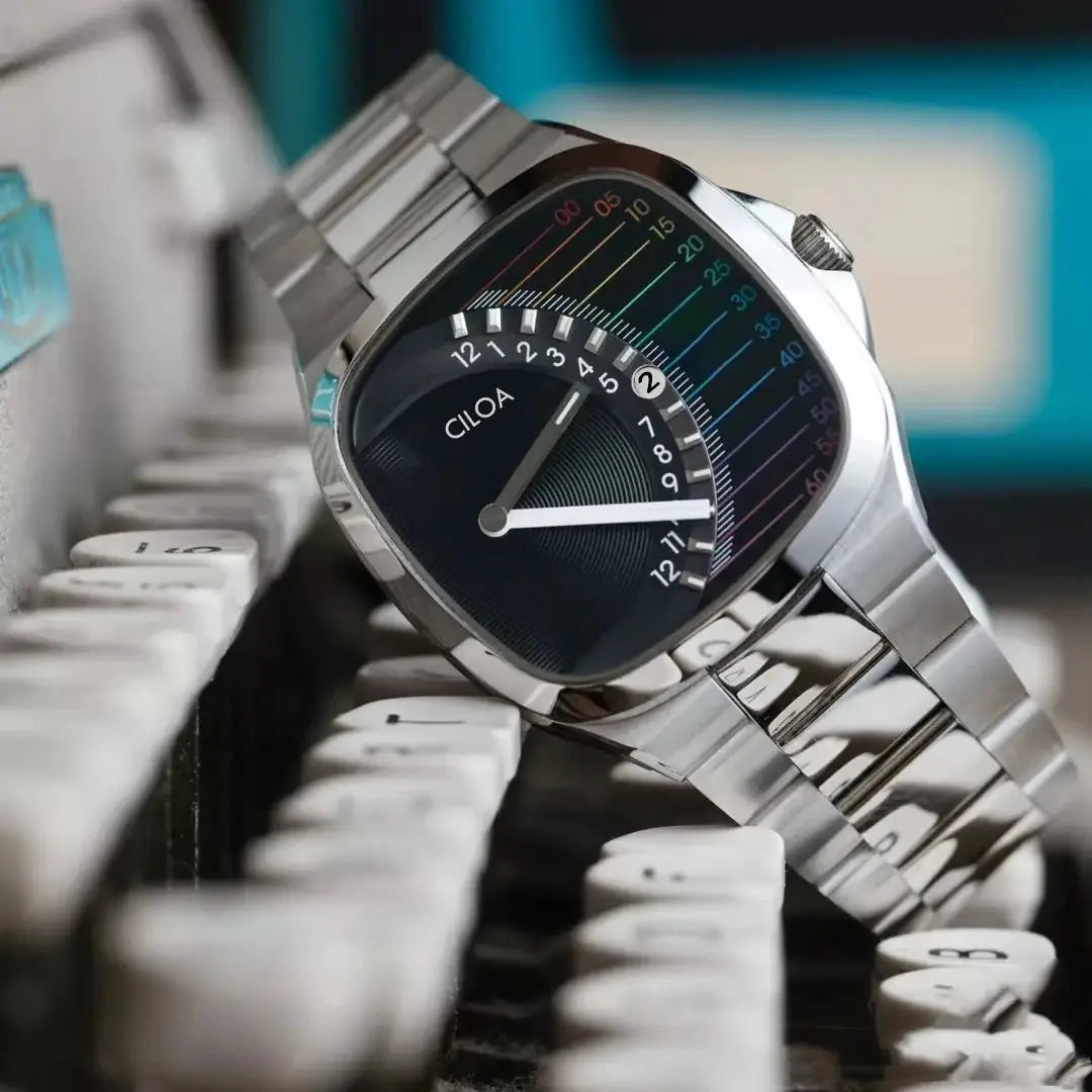 CILOA retro square men's watch with stainless steel strap and black dial with rainbow scale.