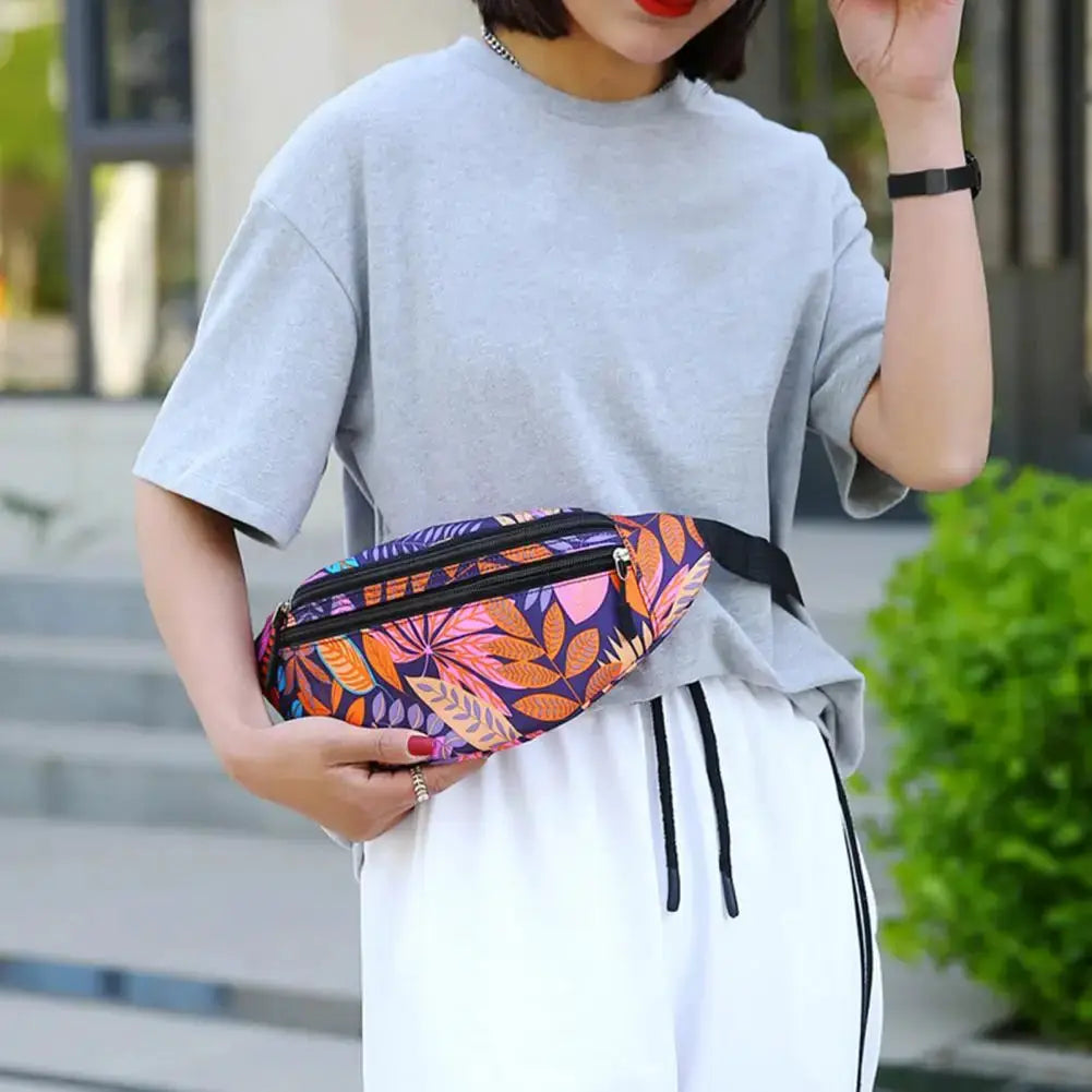 Sports waist pack by Simples Market; waterproof unisex running belt with vibrant leaf print