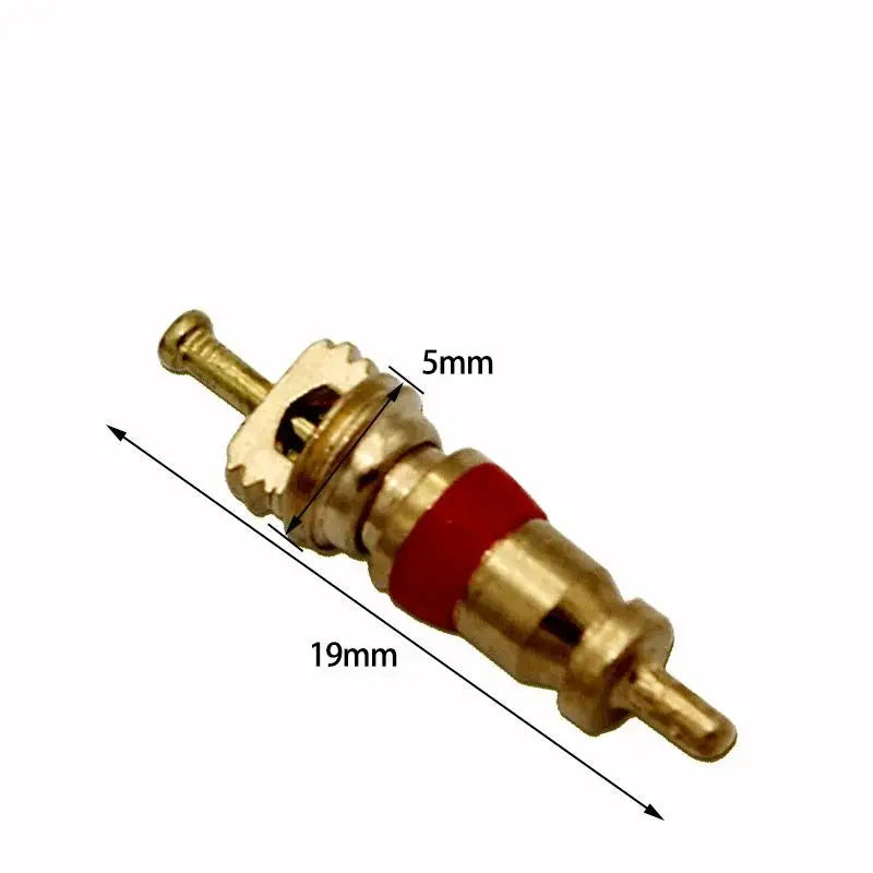 Brass tire valve core removal tool with red ring, 19mm overall length, 5mm tip