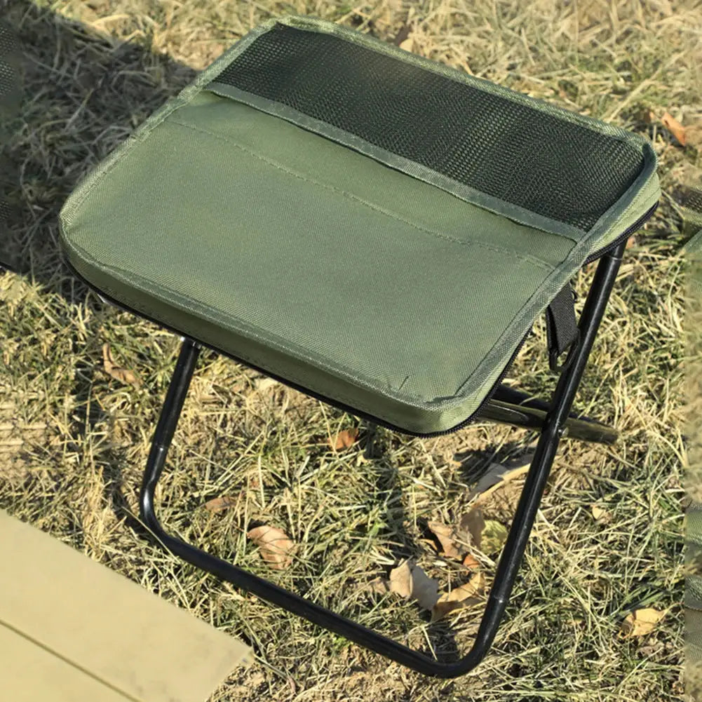 Simples Market folding camping stool, green shoulder-bag style portable seat with black metal legs