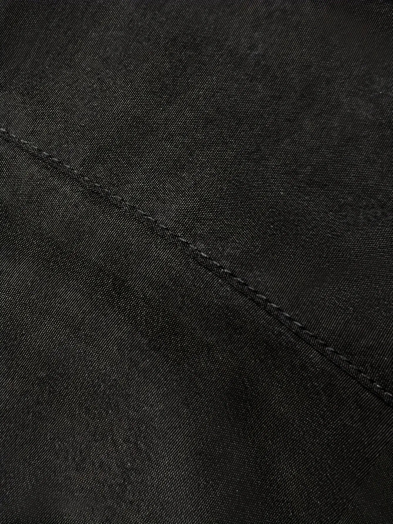 Men's cargo pants in dark denim fabric with visible topstitch seam