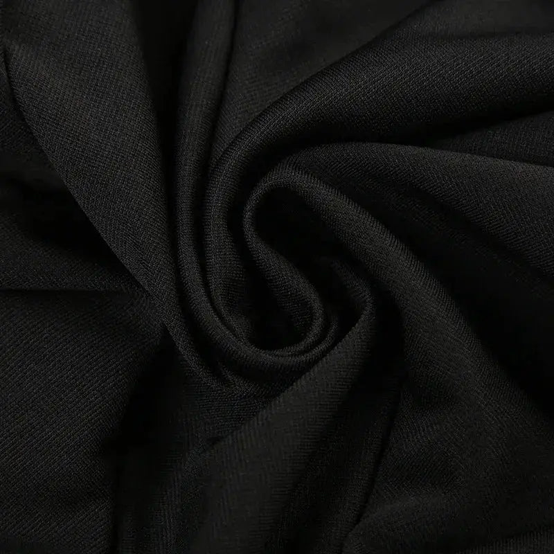 Goth Y2K black mini skirt by Simples Market; fabric close-up