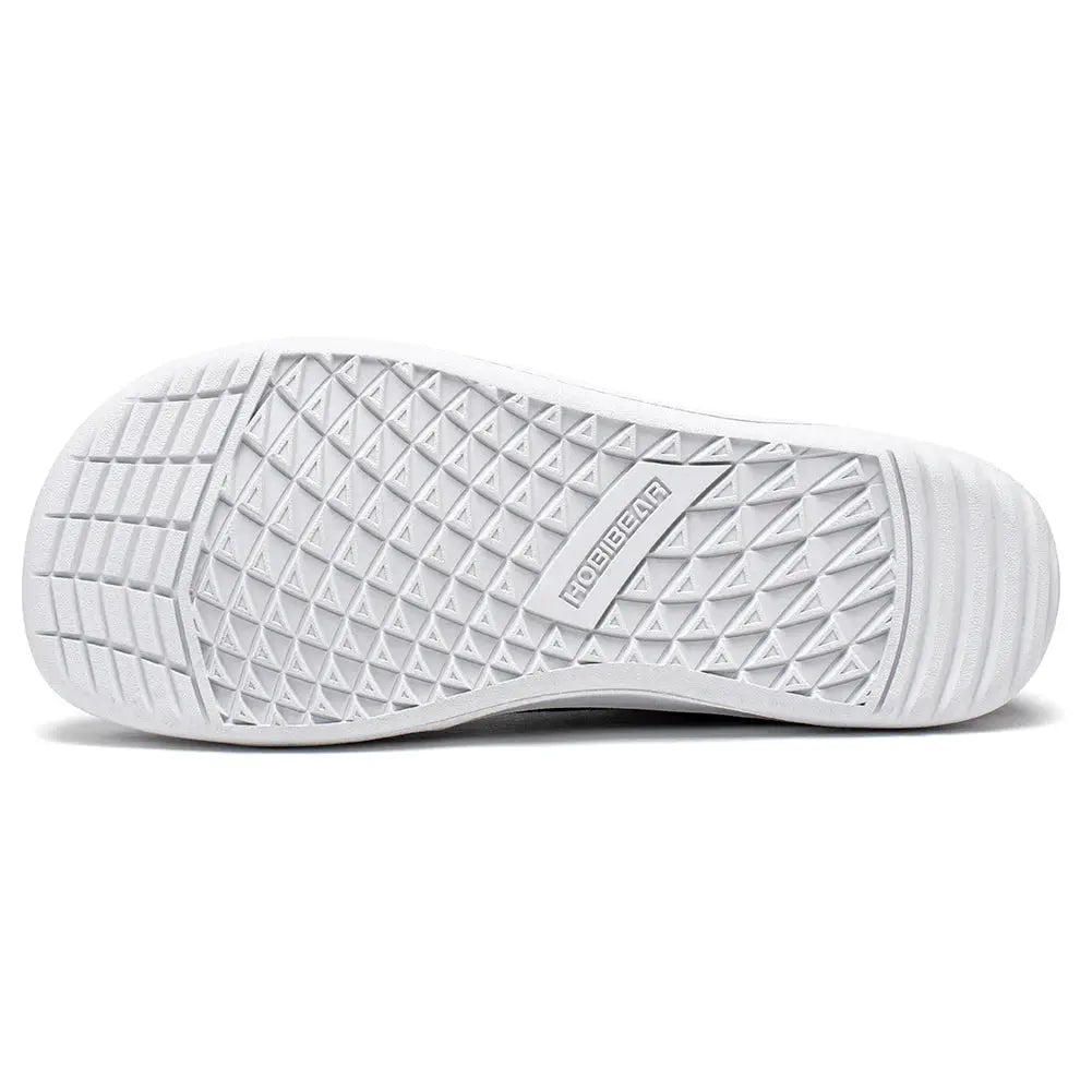 HOBIBEAR barefoot shoe outsole; white grid-pattern sole with brand label for mid-top canvas walking shoes