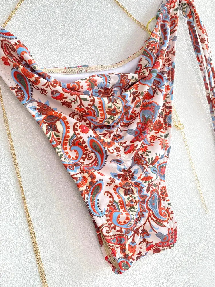 Women's triangle bikini set in pink paisley floral print.