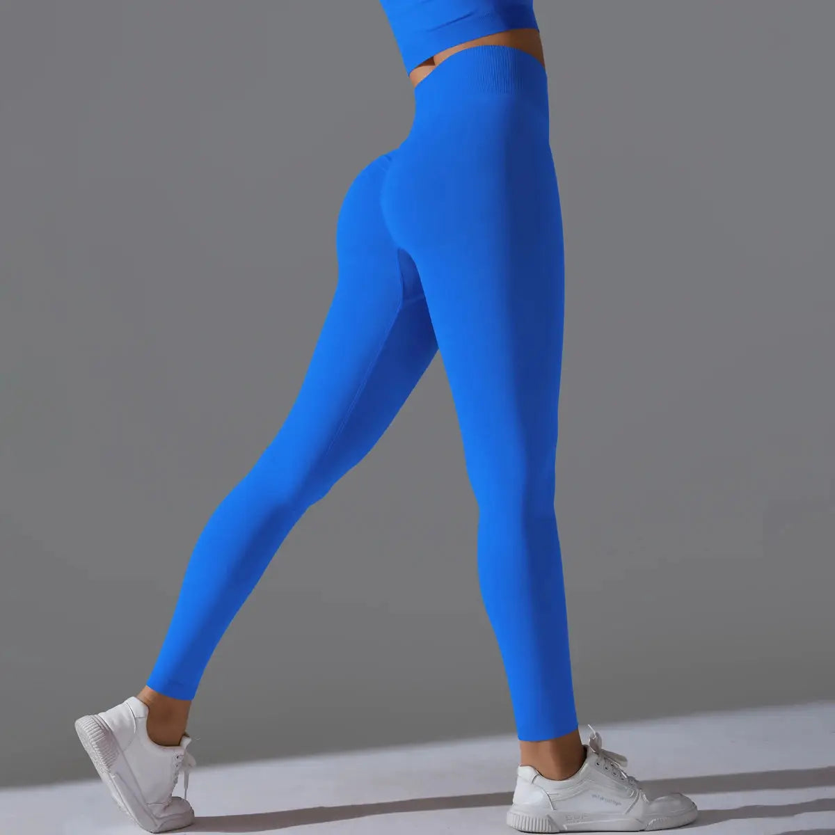 Women's seamless yoga leggings in blue with high-waist tummy control and scrunch butt lift