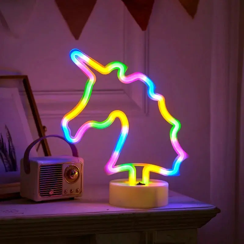 Neon sign USB LED night light by Simples Market in rainbow colors, unicorn outline design for kids' room.