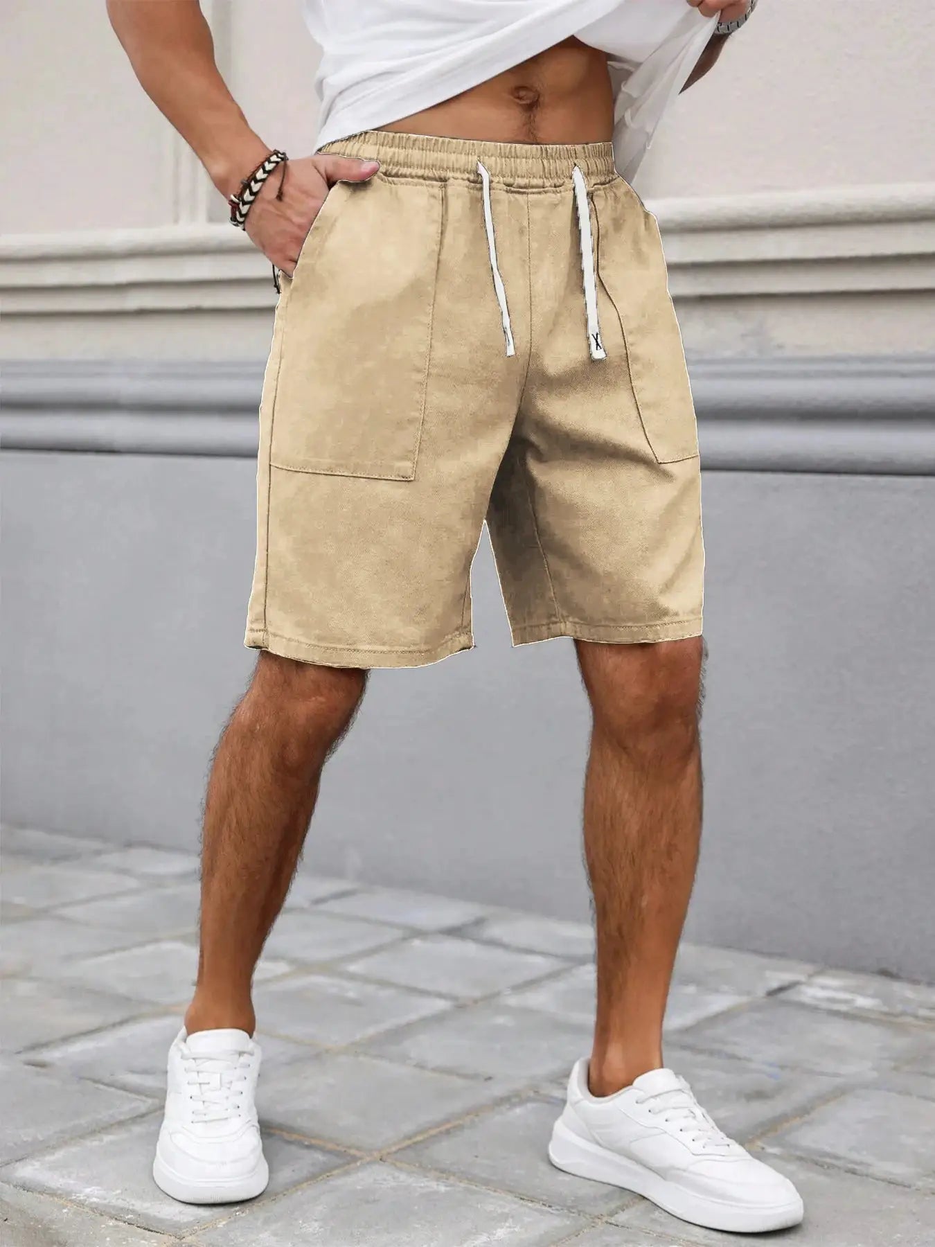 Men's beige drawstring shorts with cargo patch pockets and elastic waist, mid-length casual
