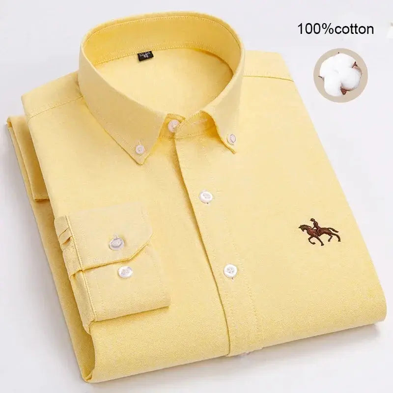 Folded yellow men's oxford shirt, 100% cotton, long sleeve with button-down collar and brown horse embroidery.