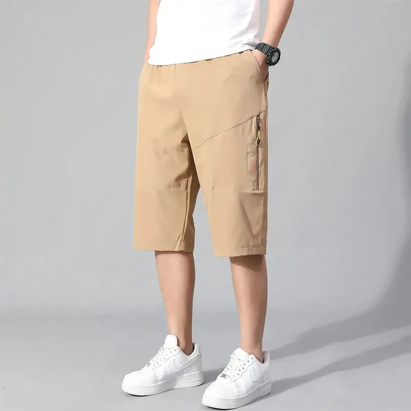 Mens khaki cargo shorts with zippered side pocket, knee-length, elastic waist, casual sports wear