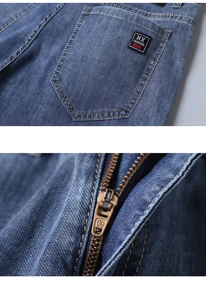 Men's blue denim jeans with back pocket, bronze zipper, and HX Fashion Jeans patch.