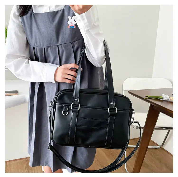 Japanese Style JK Bag in black PU leather with dual top handles and detachable crossbody strap