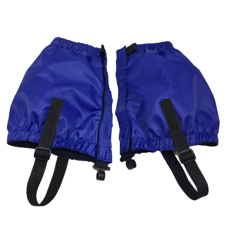 Pair of blue Simples Market waterproof legging gaiters with black adjustable straps.