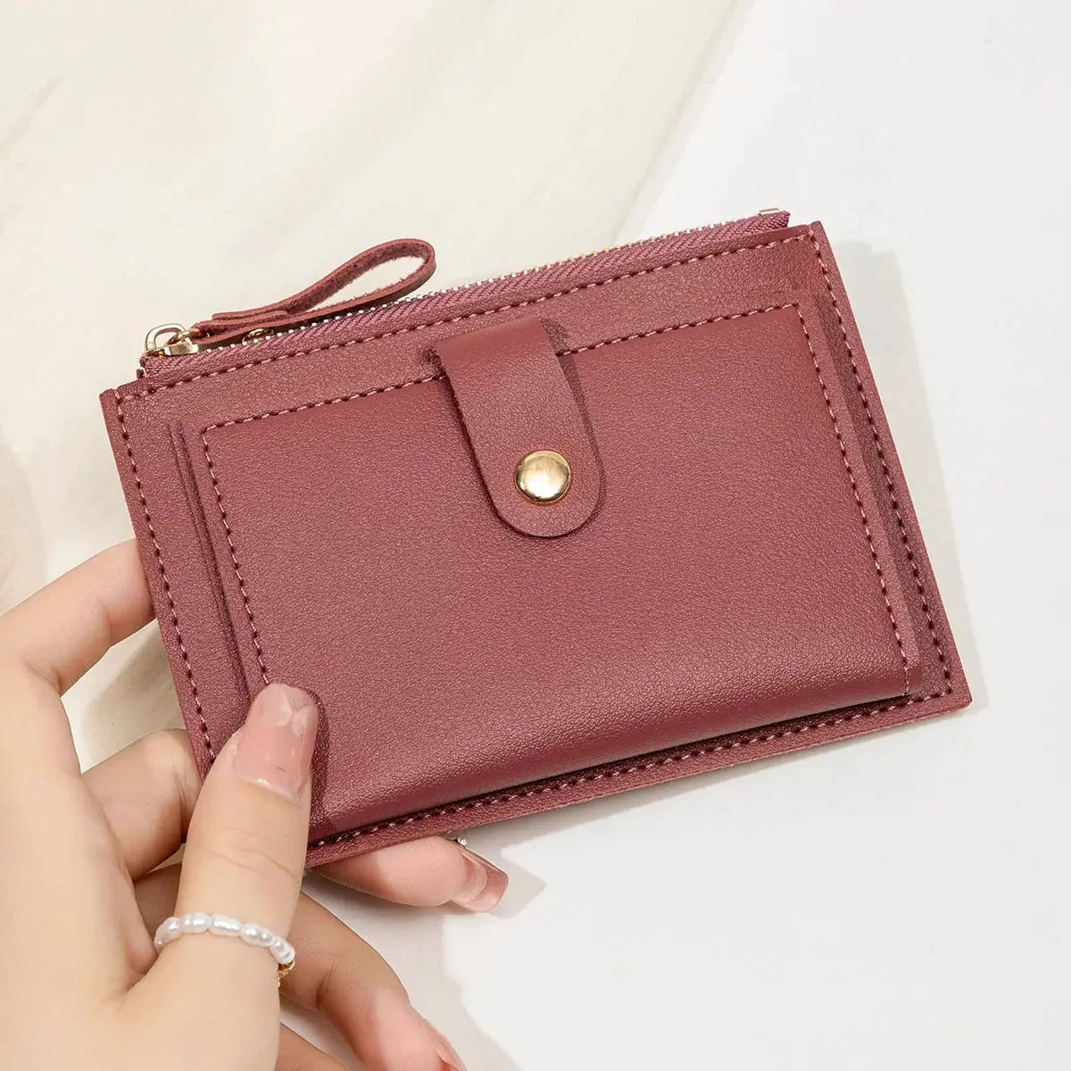 Simples Market pink PU leather minimalist women's short card wallet with zip and gold snap.