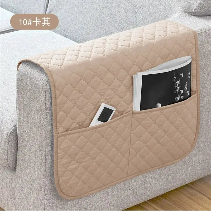 Beige quilted sofa armrest cover with pockets for remote and phone, water-repellent fabric, 1pc