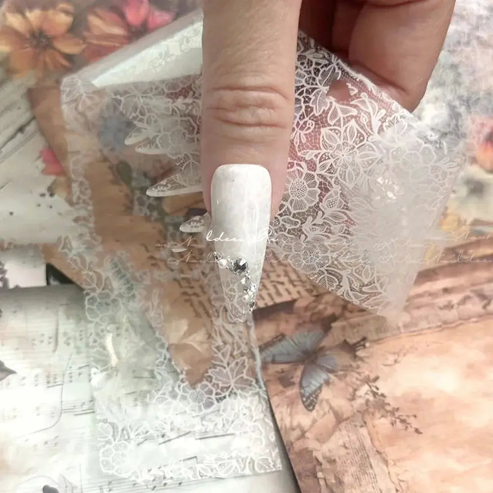 Lace nail decals in white on clear sheets for full-wrap nails, 10 rolls