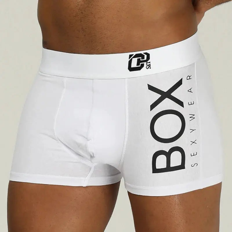 Men's white cotton boxer briefs with front pouch and side BOX branding, Simples Market.