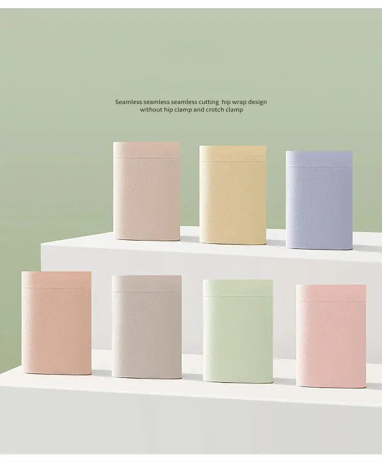 7-piece pastel cotton women's underwear set on display; breathable solid briefs in pink, mint, beige and other pastels