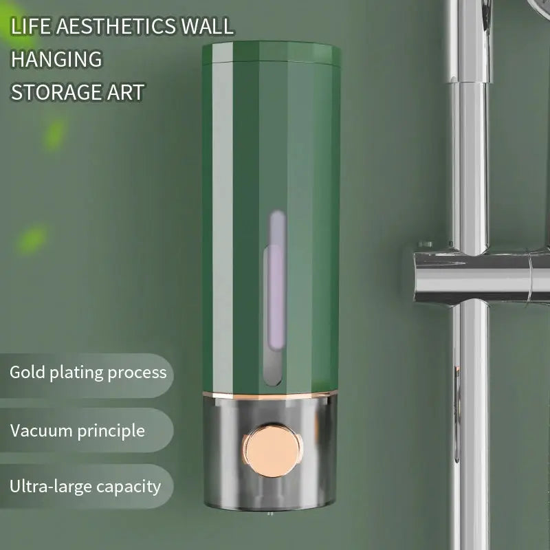 Simples Market manual wall-mounted soap dispenser in green with gold trim and clear level window