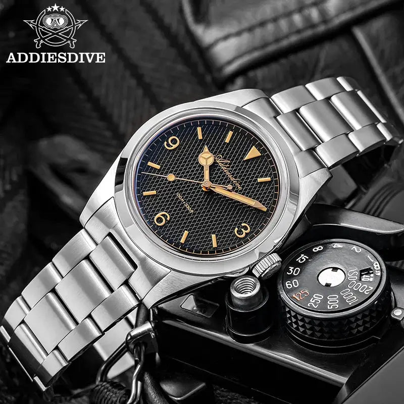 ADDIESDIVE men's analog watch with stainless steel bracelet, black textured dial, gold-tone indices and hands.