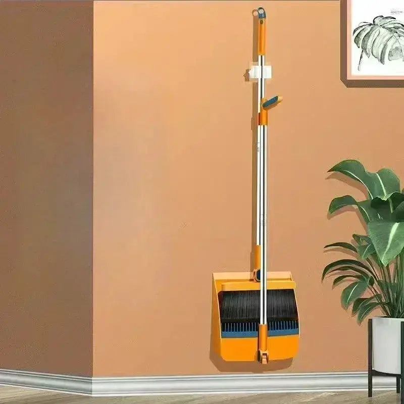 Simples Market broom set with dustpan and brush, orange and silver handles, wall-hung display