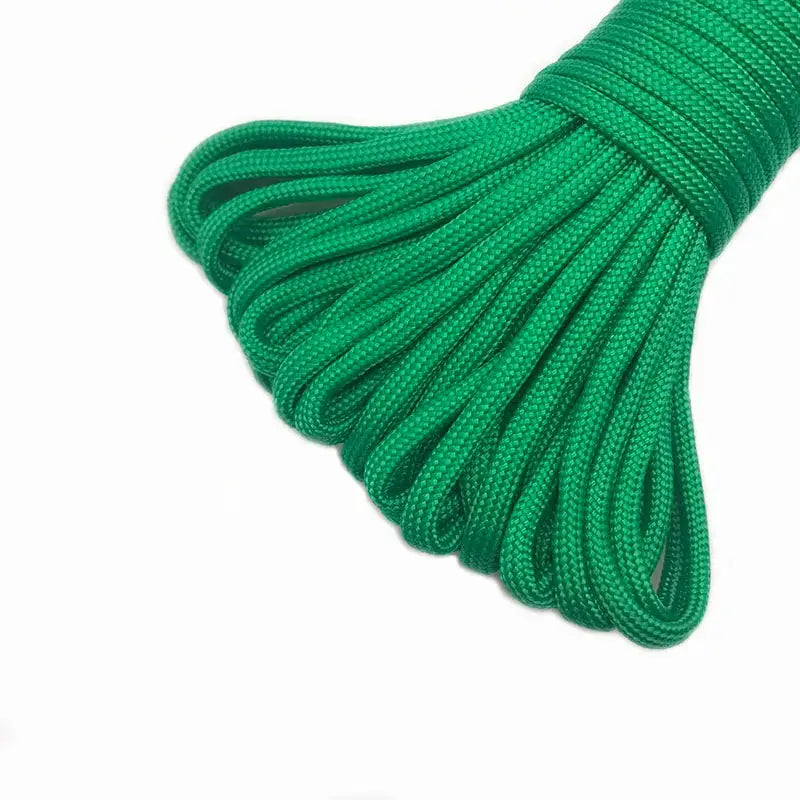 Paracord 550 rope, green, 4mm diameter, 7-strand core, coiled bundle