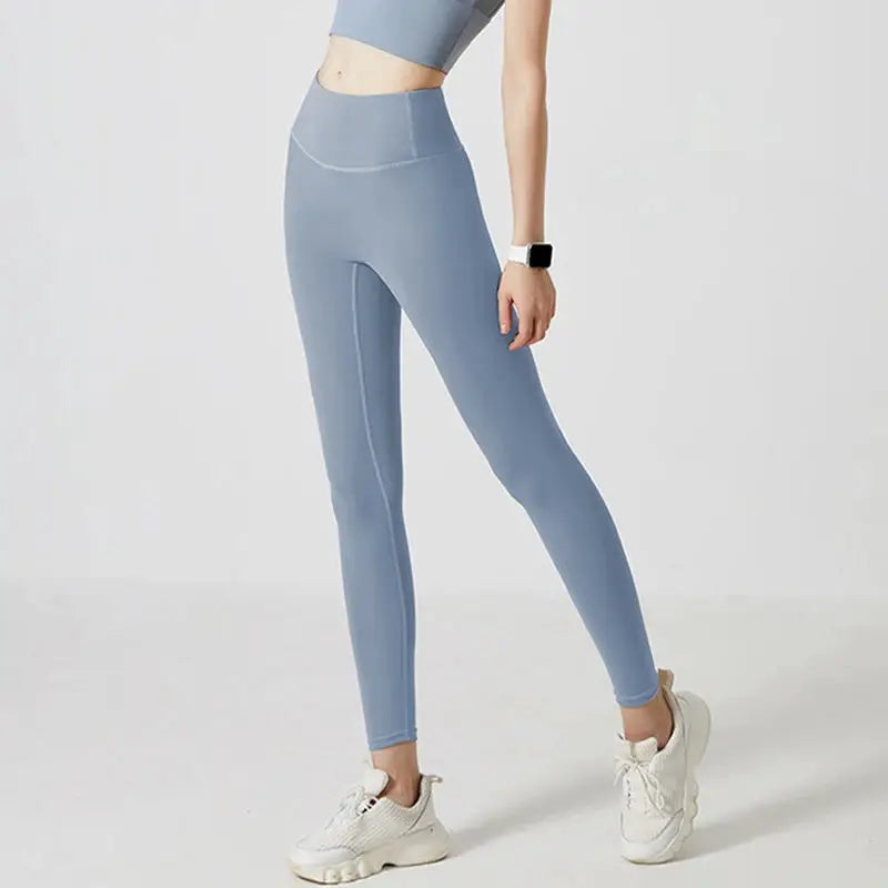 Simples Market UPF50+ women yoga leggings, light blue high-waist gym leggings for hip lifting and workouts.