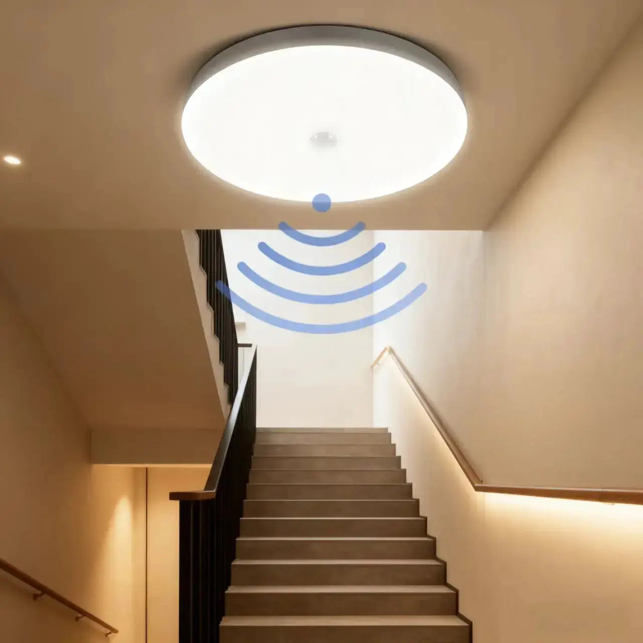 Round white LED ceiling light with motion sensor for stairwell