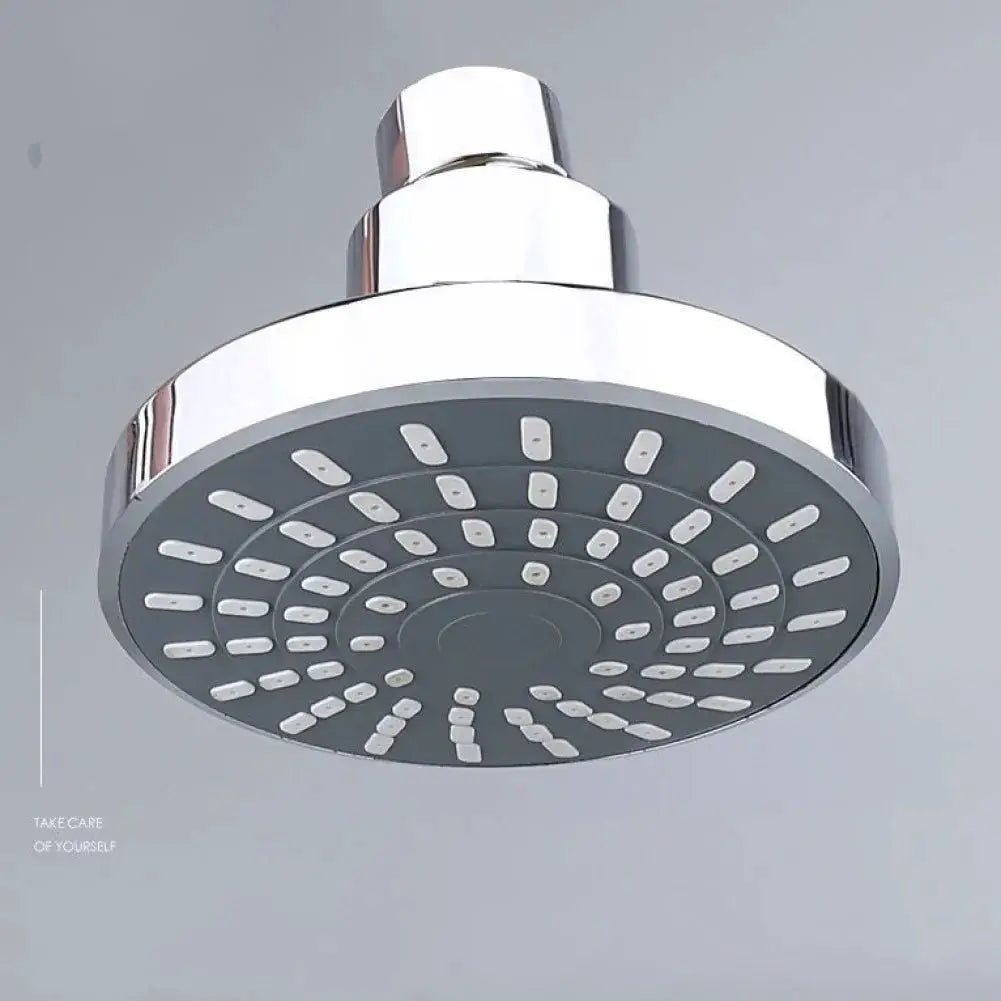 Adjustable rainfall shower head, chrome finish, wall-mounted.