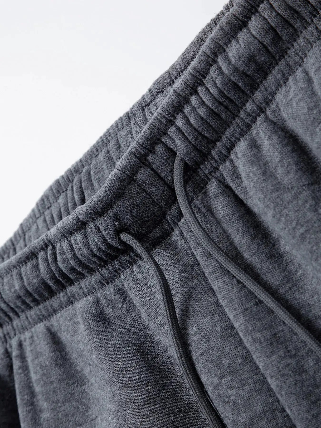 Men's jogger pants in grey heather with elastic waistband and drawstring
