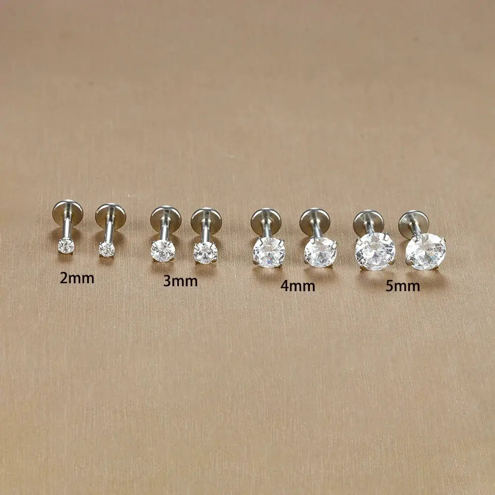 Simples Market eight-piece labret stud earring set, 16G surgical stainless steel with CZ crystals, sizes 2–5mm