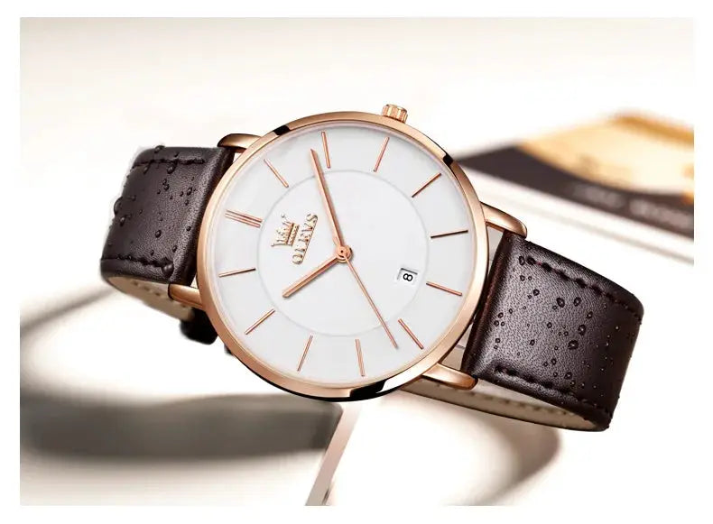 OLEVS men's ultra-thin quartz watch with rose-gold case, white dial, black leather strap and date window