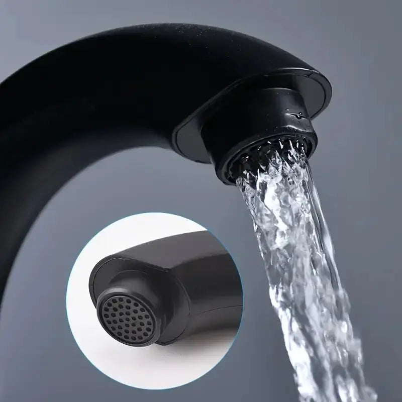 Modern matte black single-hole bathroom faucet with curved nozzle and aerator