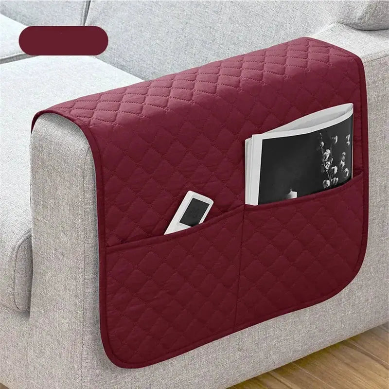 Quilted maroon sofa armrest slipcover with hanging pockets for remote and magazine