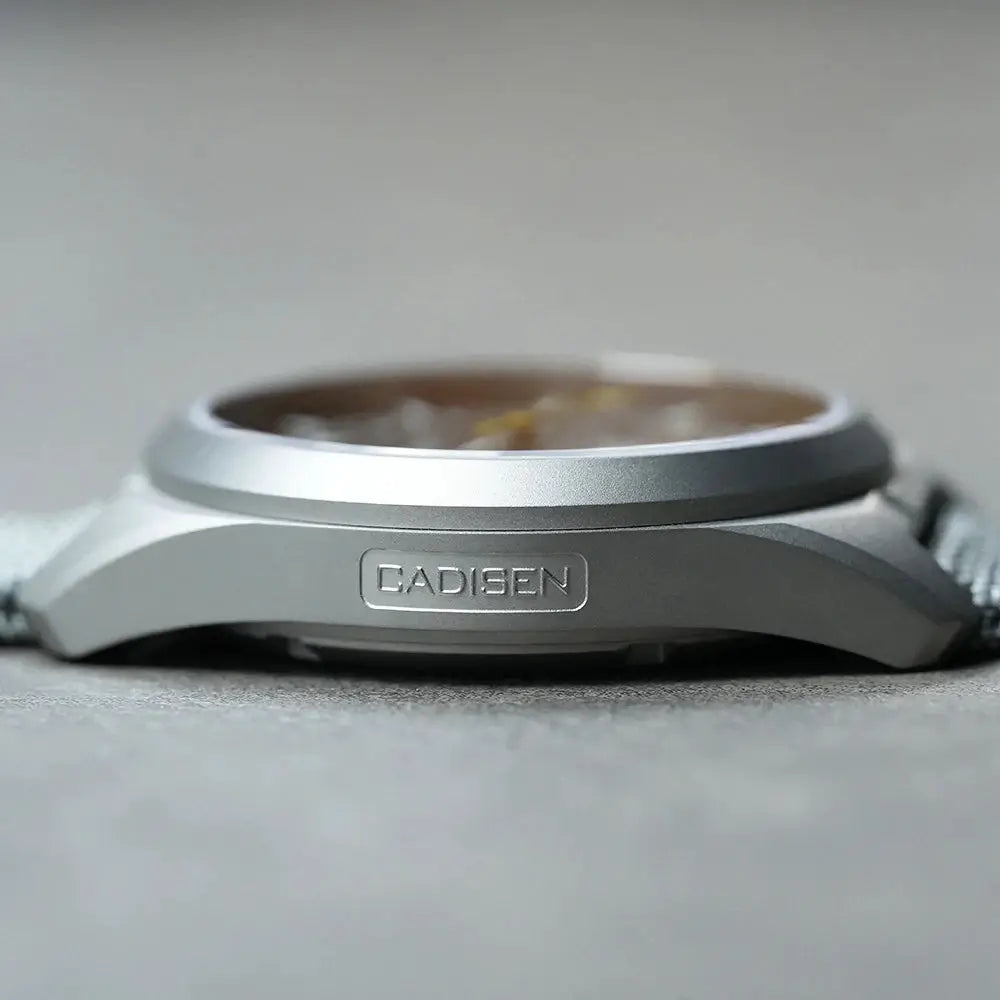 CADISEN TI-7 wristwatch; silver titanium-steel case with CADISEN logo on the side