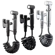 Toilet cleaning bidet set with three handheld sprayers and coiled hoses, black and chrome finishes, by Simples Market