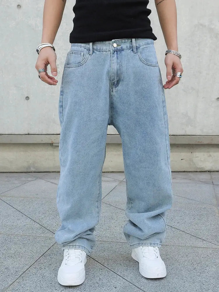 Men's baggy denim jeans, oversize straight fit in light blue, casual streetwear wide-leg style