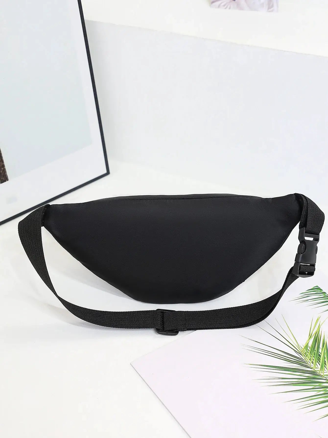 Black nylon waist bag fanny pack with adjustable strap and plastic buckle