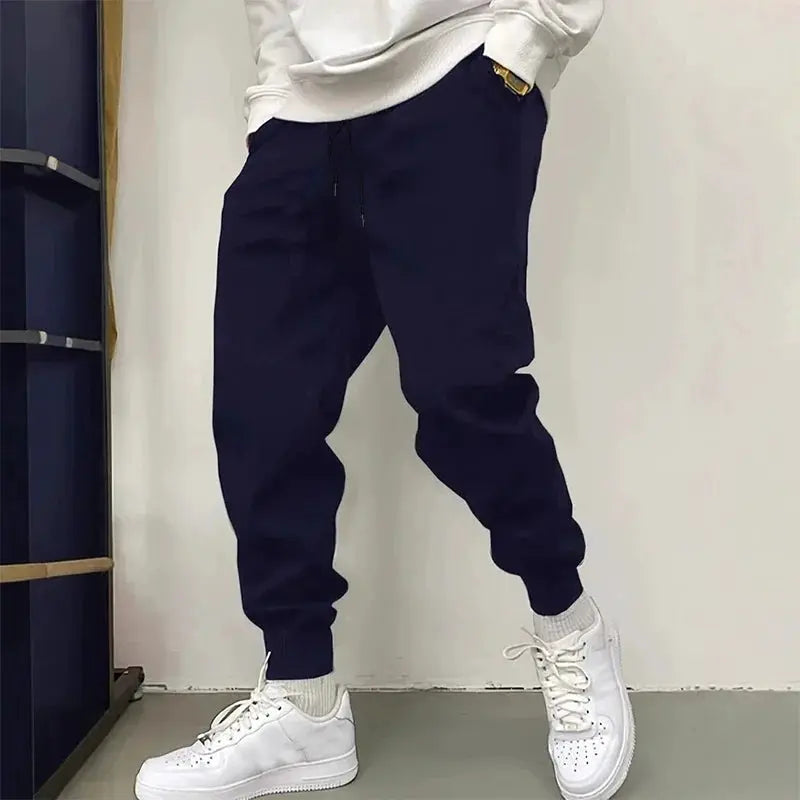Men's navy solid jogger pants with drawstring waist for casual daily wear