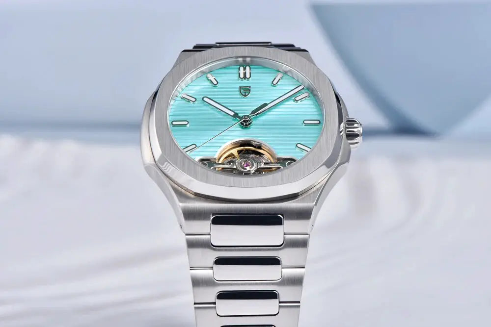 Pagani Design stainless steel men's watch with turquoise skeleton dial and exposed balance wheel; silver bracelet