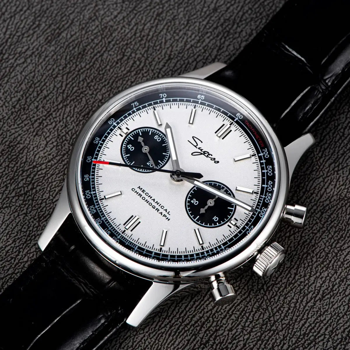 Sugess 1963 Pilot Panda chronograph watch with stainless steel case, white dial, black subdials, black leather strap.