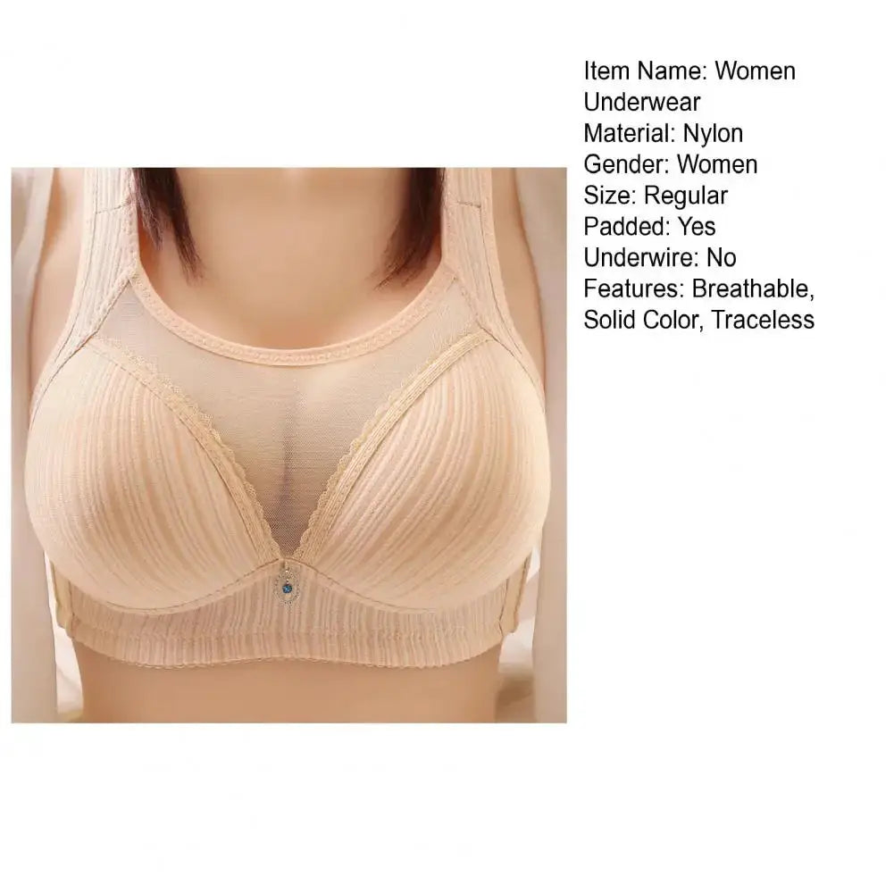 Beige wireless bra with wide straps and padded cups; breathable fabric