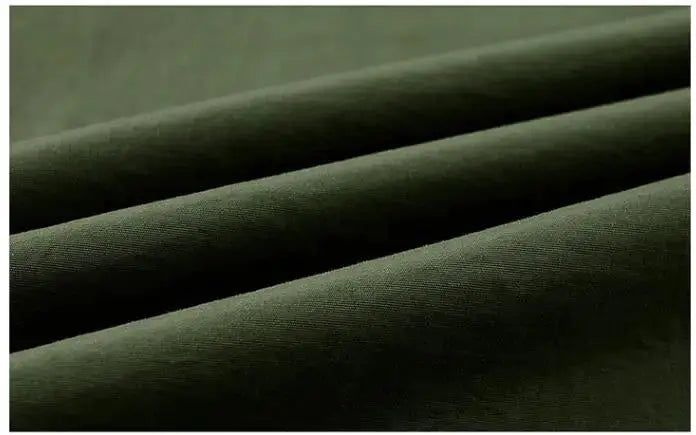 Simples Market olive green fabric close-up with soft folds and texture