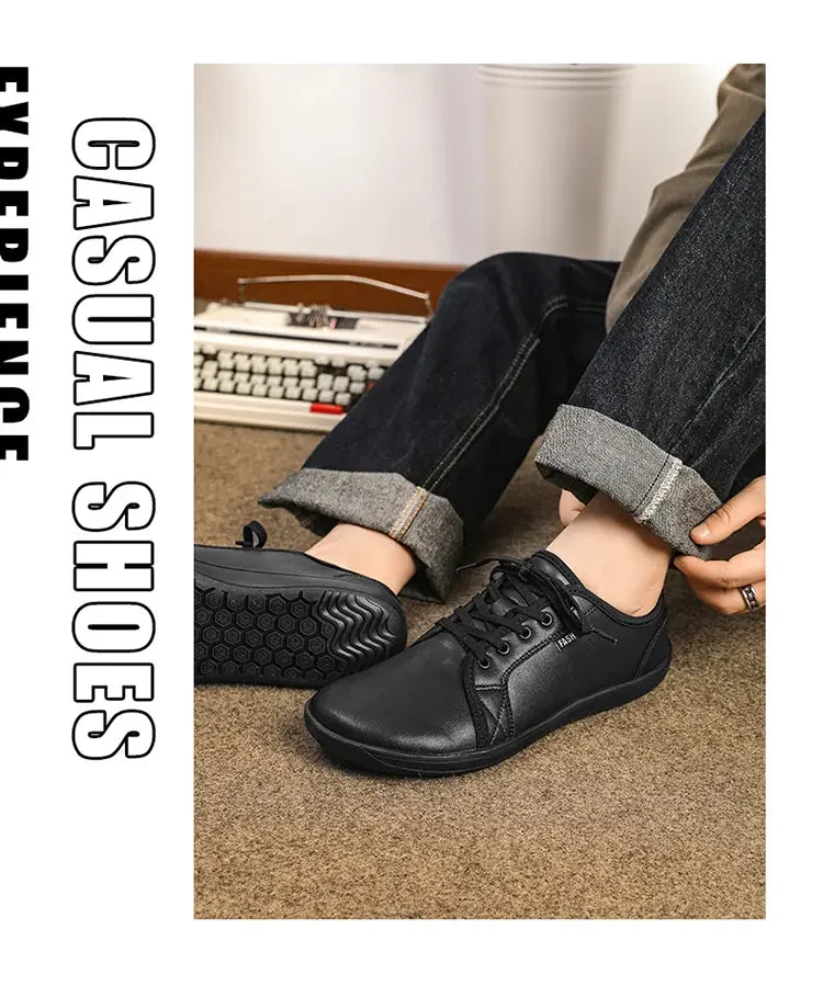 Casual black lace-up shoes with hex-pattern rubber sole; lightweight and flat
