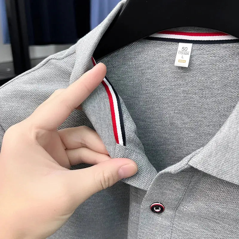 Men's polo shirt by Simples Market in grey with red, white and navy striped collar trim