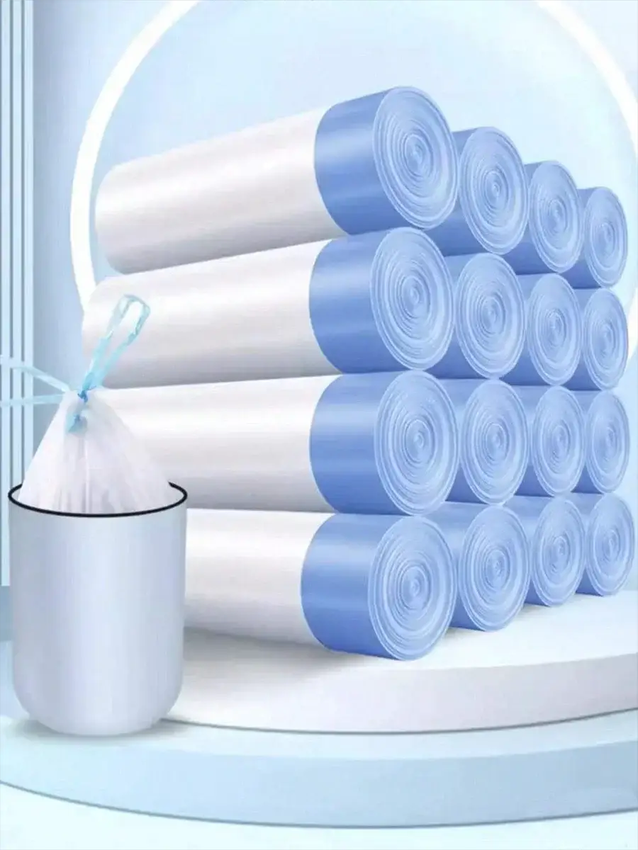 Thick trash bag liners by Simples Market with tear-off drawstrings, white bags with blue ends, multiple rolls