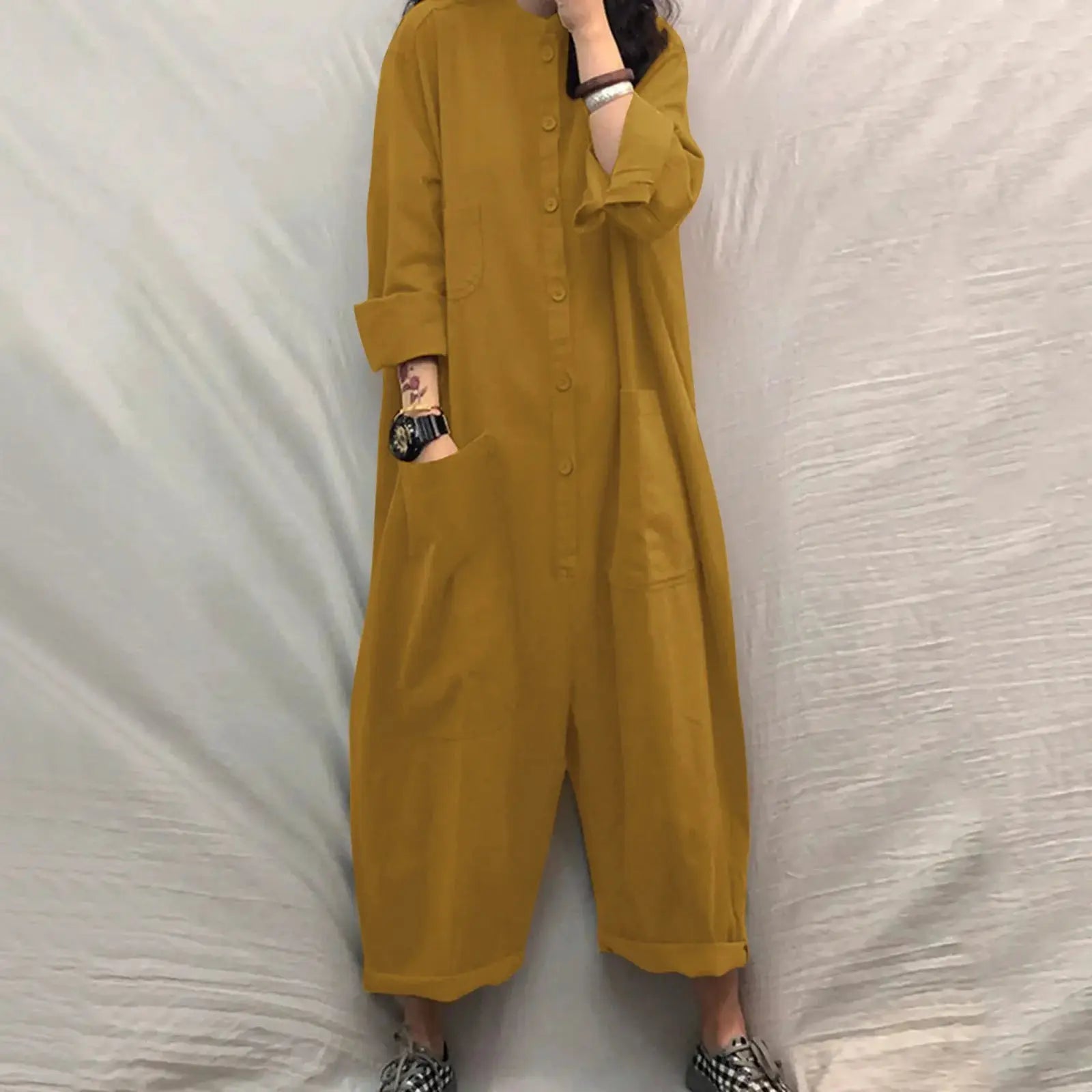 Simples Market solid mustard yellow loose-pocket jumpsuit with long sleeves and button front