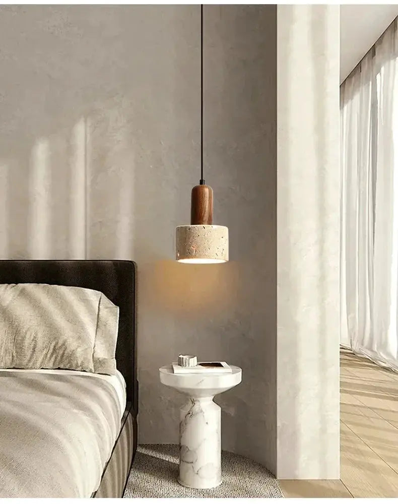 Simples Market travertine droplight pendant lamp with wood accent over marble nightstand beside bed